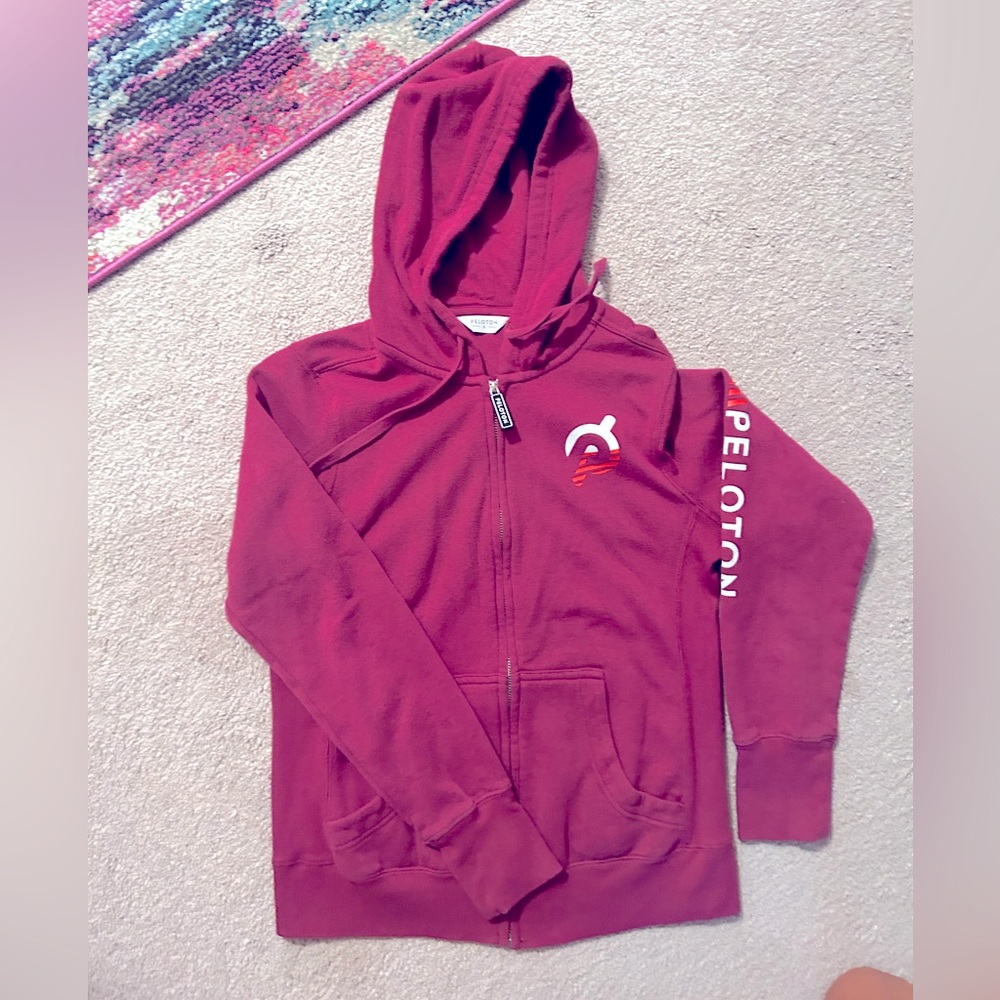 Peloton brand zip up hoodie.  Barely worn!  Burgundy/wine/deep red color.